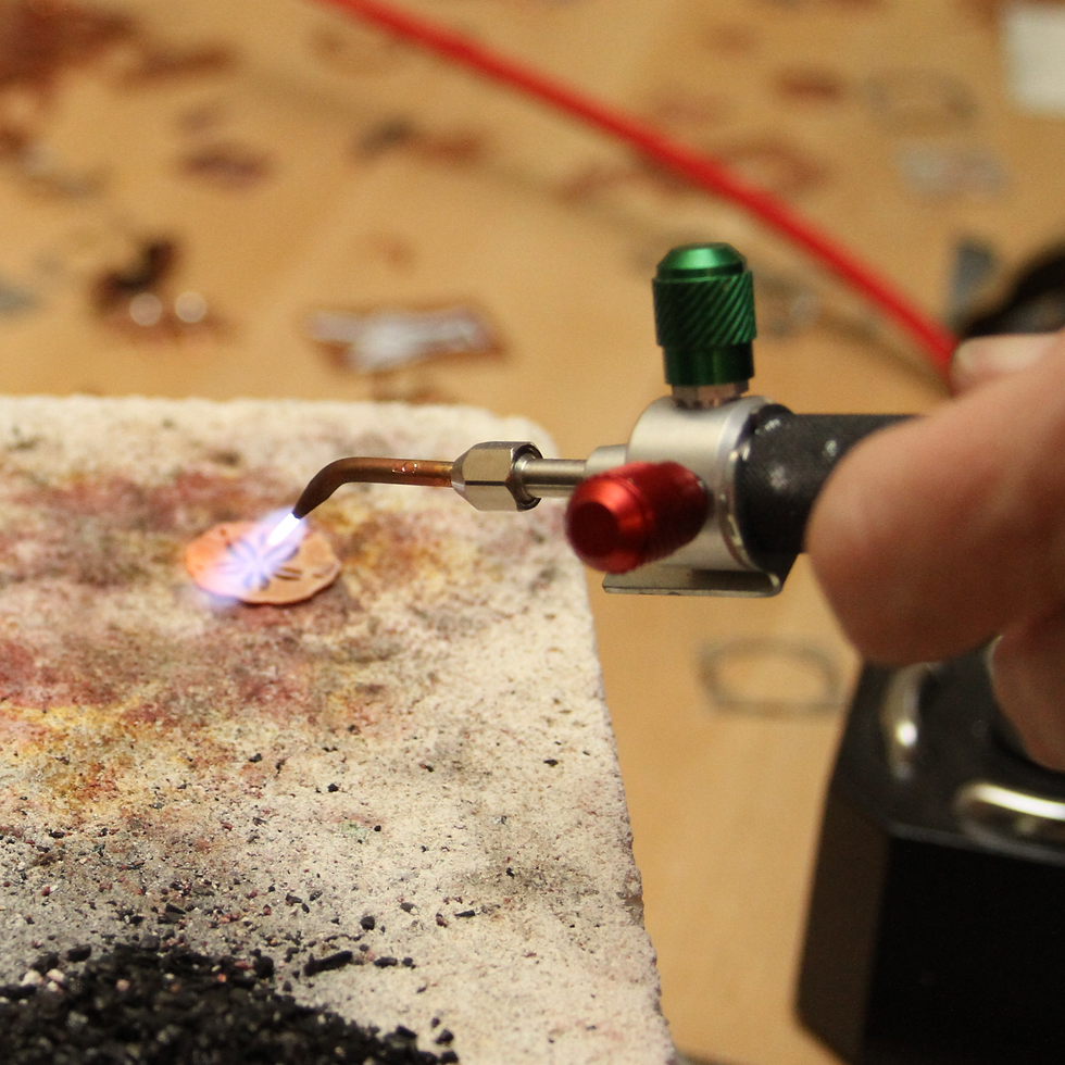 Thumbnail: Wanda using blow torch to texture the silver.