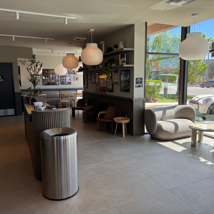 The interior of Joe and the Juice featuring custom furniture and lighting. 