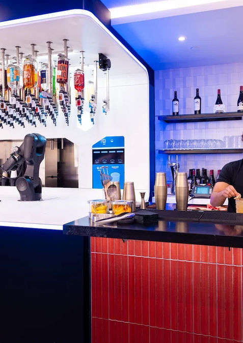 Gameway Portal Lounge custom bar with specialty millwork and integrated hospitality fixtures at MSP Airport