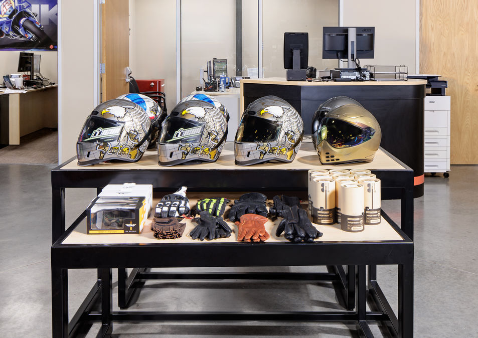 A custom made nesting table for motorcycle helmets designed and engineered by DisplayIt Inc.