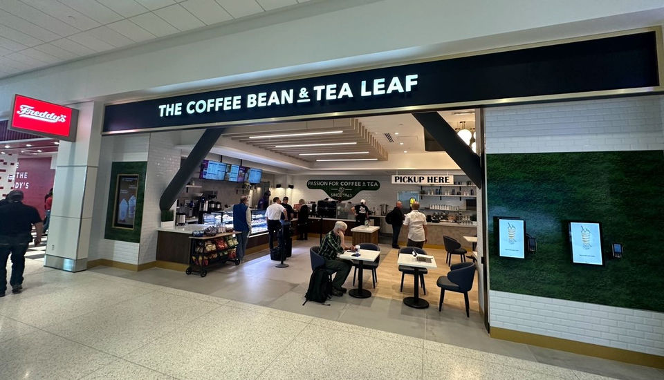 DisplayIt’s retail project management and millwork fabrication for The Coffee Bean & Tea Leaf café interior featuring branded display elements.