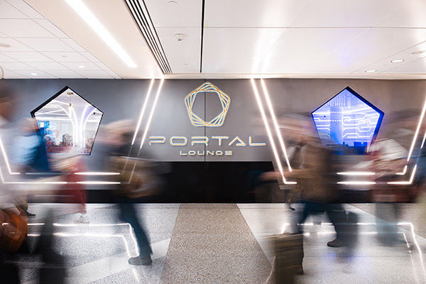 Branded Gameway Portal Lounge exterior at MSP Airport with custom illuminated architectural wall features