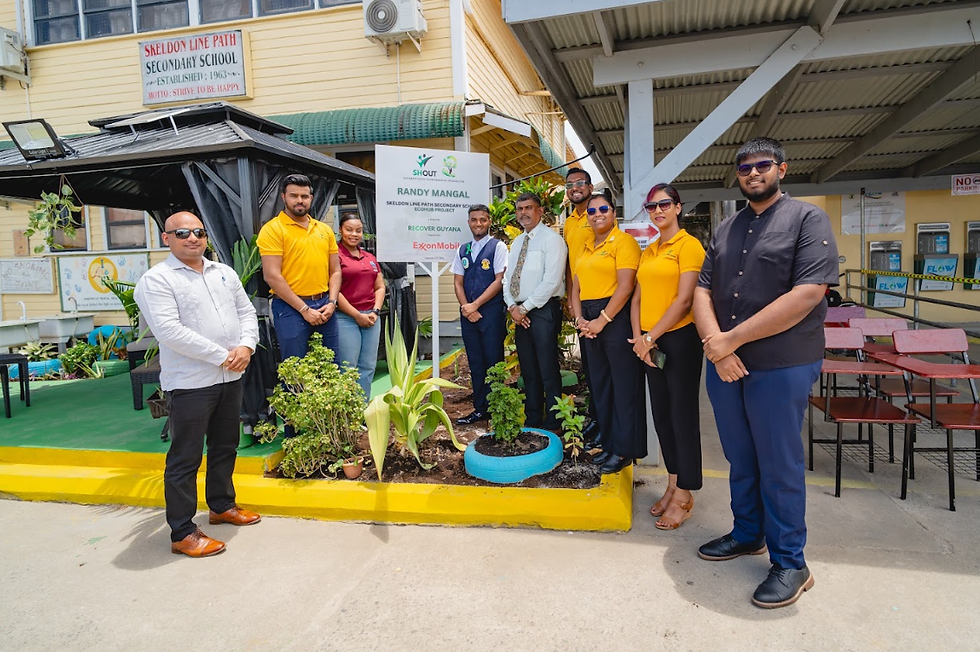 Representatives of Recover Guyana, ExxonMobil Guyana and the Regional Executive Officer for Region 6 with SHOUT 2026 winner Randy Mangal and the Headteacher at the newly launched EcoHub.