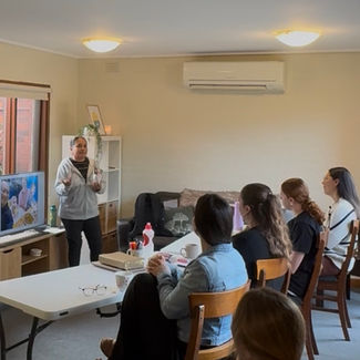 YWAM Lives and Tribes staff member introducing a Discipleship Bible School (DBS) class in Melbourne, Australia, welcoming students into biblical training and discipleship.