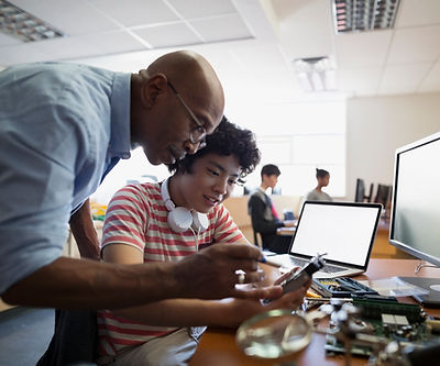 Teacher Assisting a Student