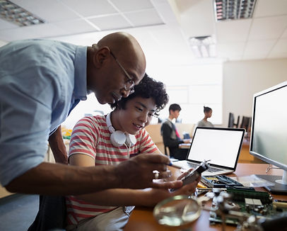 Teacher Assisting a Student