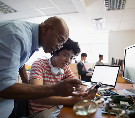 Teacher Assisting a Student