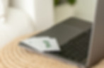 Close-up of laptop with Grid Socials’ branding assets and design tools during a creative session