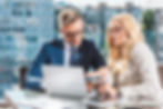 confident-business-colleagues-using-laptop-during-2022-01-19-00-05-26-utc.jpg