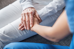 close-up-image-of-caregiver-holding-hands-of-elder-2025-01-09-03-36-43-utc.jpg
