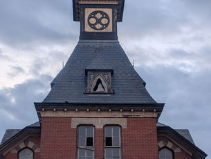 closed train station with a gloomy sky behind