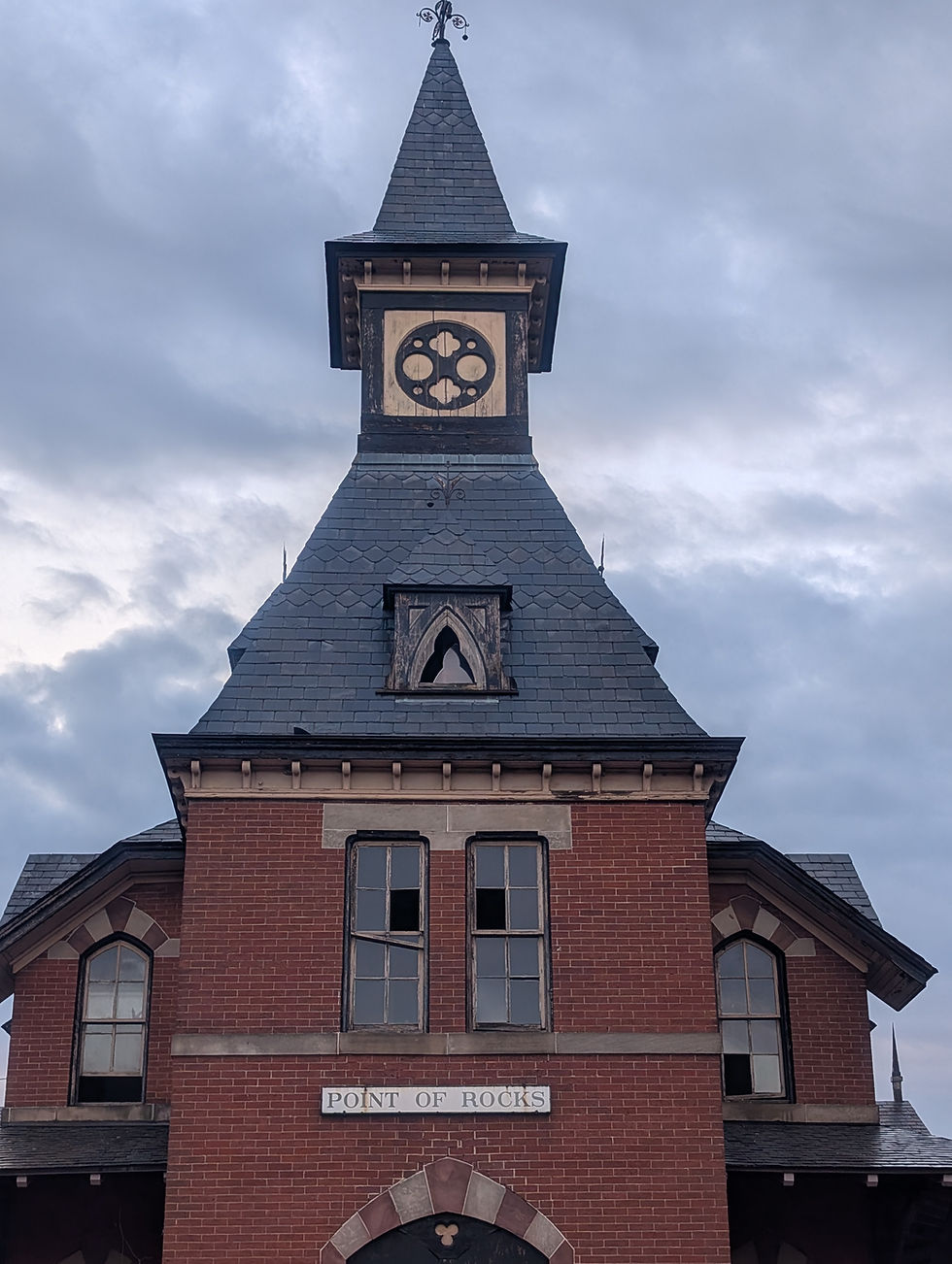 closed train station with a gloomy sky behind