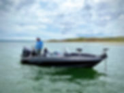 High Plains Outfitting fishing guide, Alan Evans, fishing on his boat