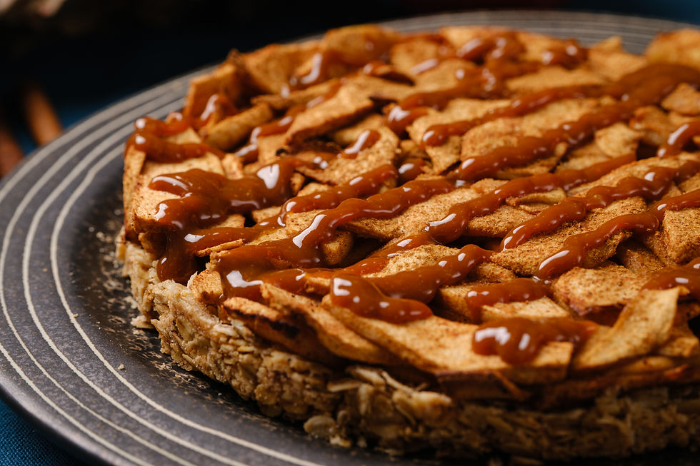 A Poe-worthy twist on tradition — this gluten-free apple tart drizzled with spiced caramel is a darkly delicious finish to our Hazelnuts and Homicide–inspired Thanksgiving feast.