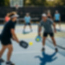 happy people playing pickleball outdoors, enjoying activity thanks to pain relief from the acupuncture clinic in shelton ct.