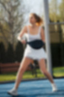 full-shot-fit-woman-playing-paddle-tennis_23-2149434159.jpg