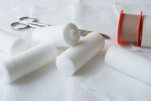 Medical bandages with scissors and sticking plaster.jpeg
