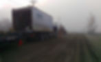 A commercial trailer carrying machines