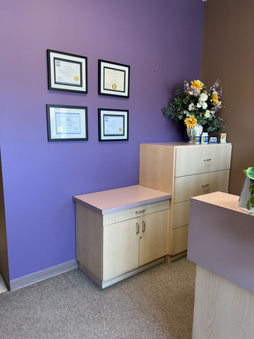 Wall in the clinic with the doctor’s certificates