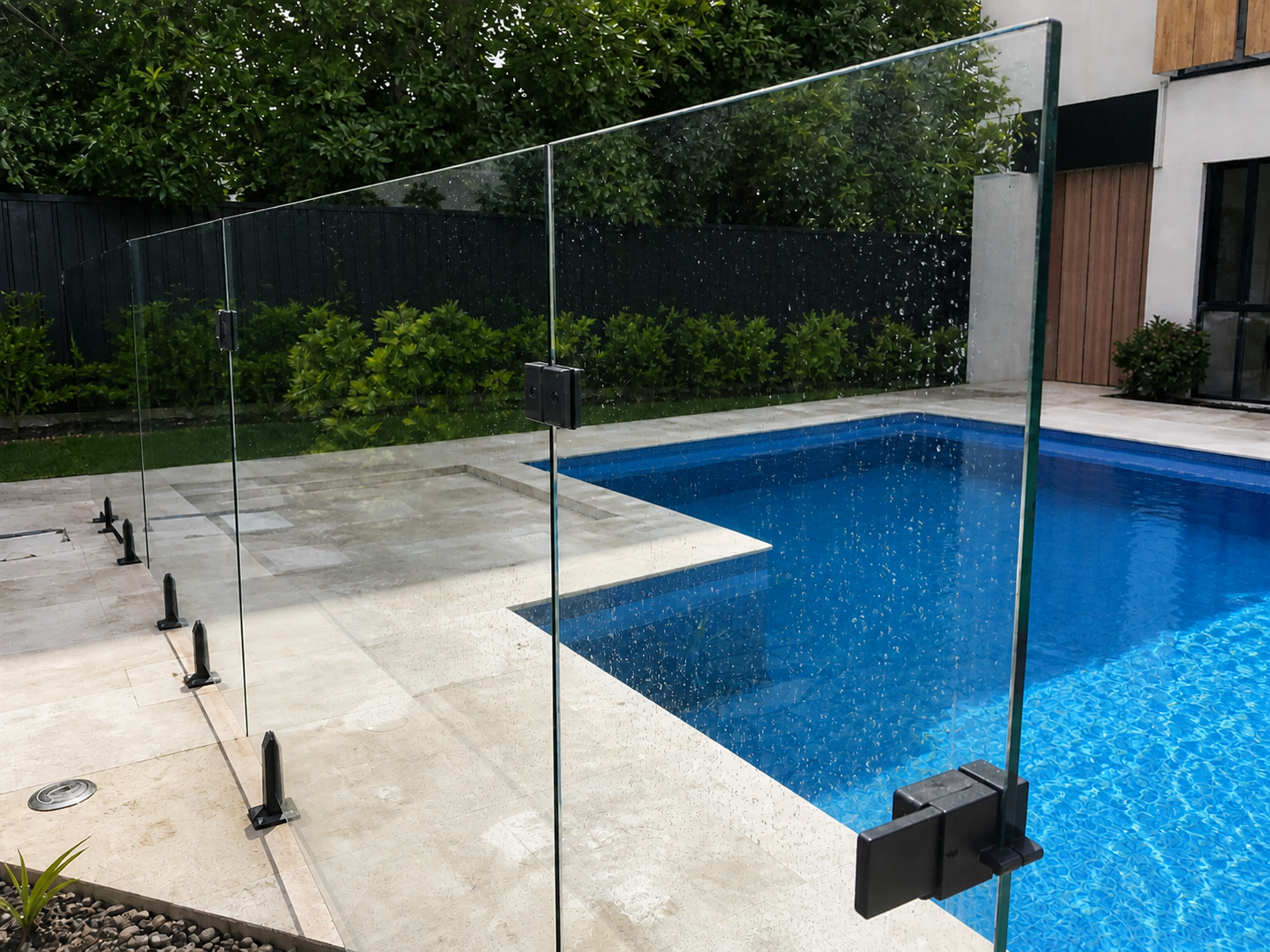 Pool glass after hydrophobic coating with water beading and clearer outdoor glass