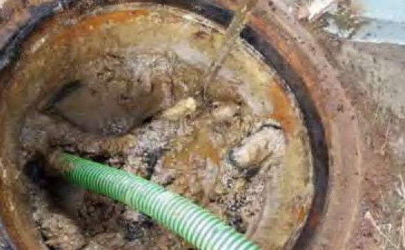 Hotel STP drainage channel with grease accumulation before biological fat, oil and grease treatment.
