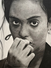 Portrait of woman staring at the camera looking pensive