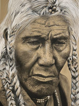 Portrait of old man of the First Nations Tsuu T'ina nation looking down