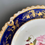 Thumbnail: Coalport plate, cobalt blue, gilt vines and rose and pansy, ca 1820
