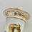 Thumbnail: Pair of Staffordshire spill vases, children, Stonehenge and bird, ca 1820