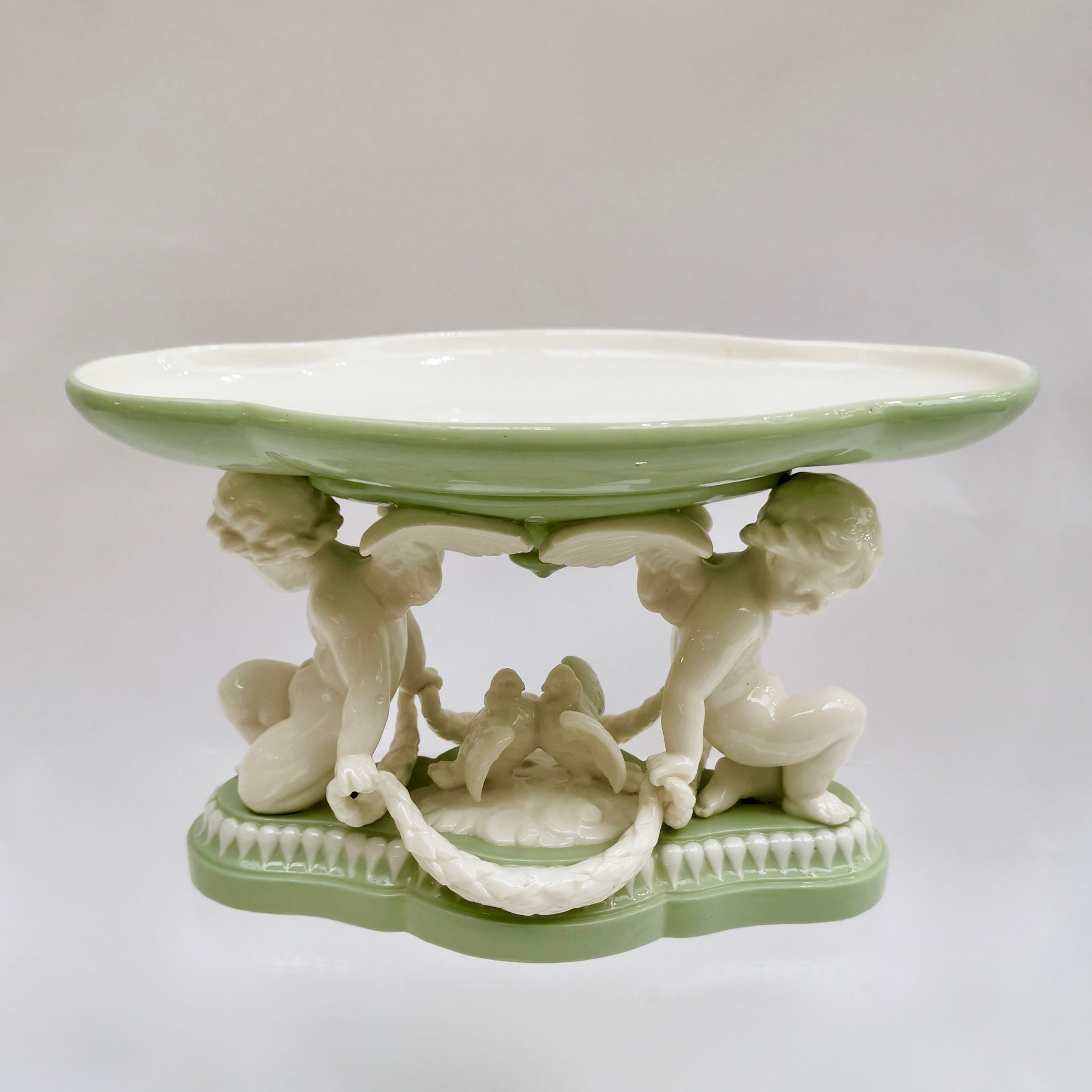 Minton tazza with parian cherubs and doves, 1855