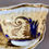 Thumbnail: Samuel Alcock teacup and milk jug, pale yellow, gilt and flowers, ca 1824