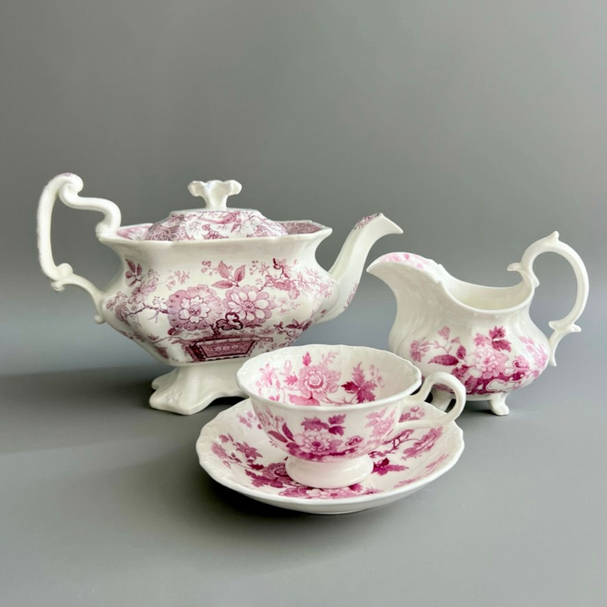 Thumbnail: Samuel Alcock milk jug, white with puce print of rock and rose pattern, ca1828