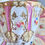 Thumbnail: Samuel Alcock cup, saucer and plate, pink, gilt, flowers, ca 1847