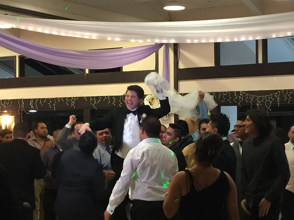 men lifting another man up
