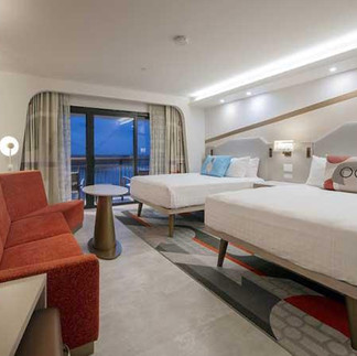 Disney's Contemporary Resort guest room themed to The Incredibles with modern furnishings and family-friendly accommodations.