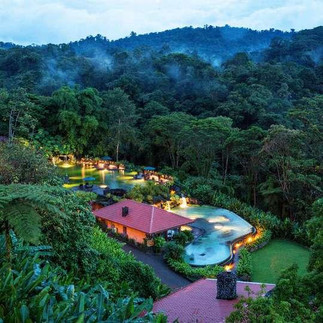 Luxury Costa Rica resort surrounded by rainforest and jungle scenery, featuring tropical pools and eco-luxury travel experiences.