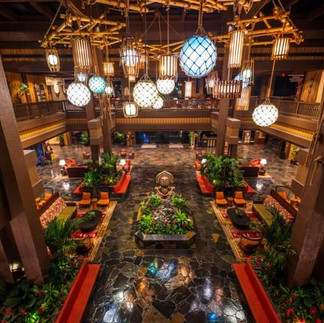 Disney's Polynesian Village Resort lobby featuring tropical décor and South Pacific-inspired architecture at Walt Disney World.