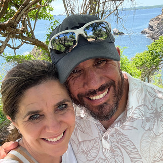 Couple enjoying a romantic getaway at Four Seasons Tamarindo Mexico with ocean views, a private luxury destination perfect for couples travel.