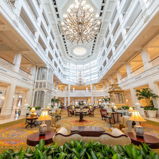 Grand Floridian Resort lobby at Walt Disney World featuring elegant Victorian architecture, grand chandeliers, and luxury Disney accommodations.