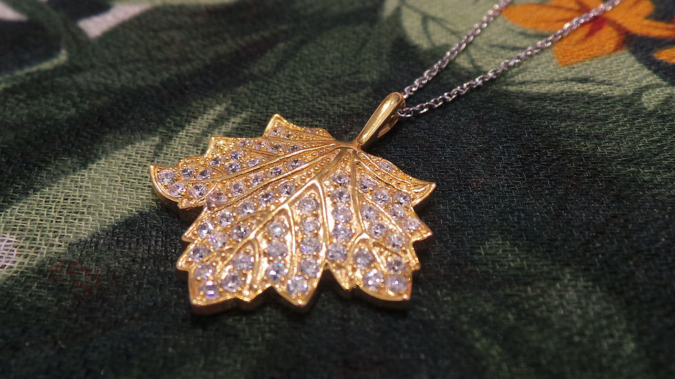 Thumbnail: Zircon Cluster Maple Leaf Pendant