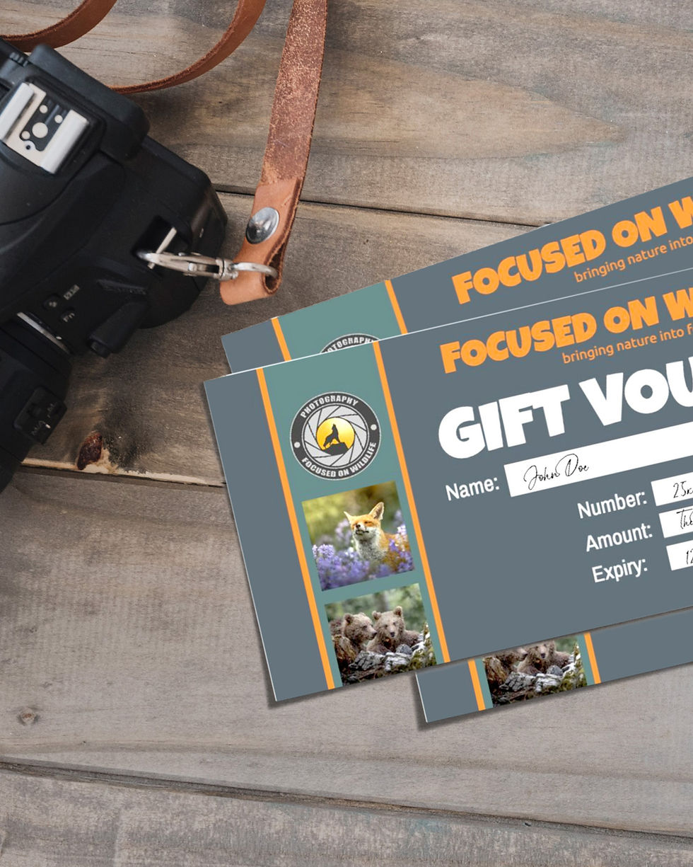 Photography workshop gift voucher on a table, ready to give as a present.