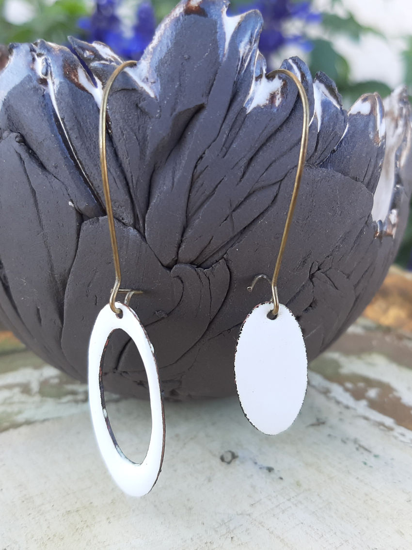 Miniature : Les Boucles d'Oreilles Asymétriques