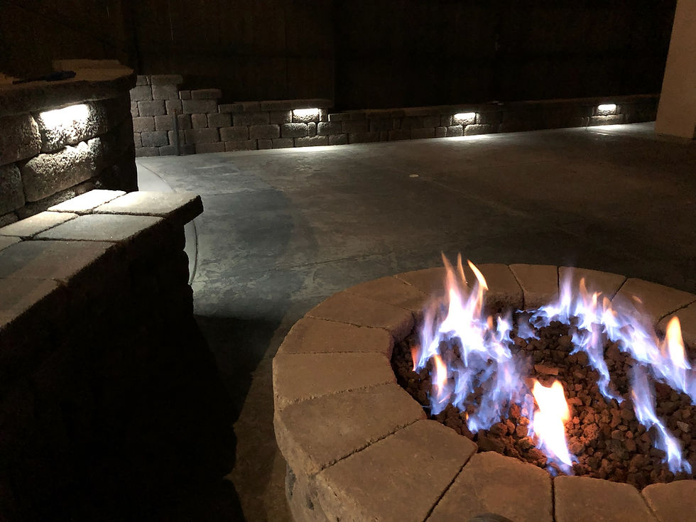 Backyard Nights Done Right – Fire Pit & Retaining Wall Installation in Greystone