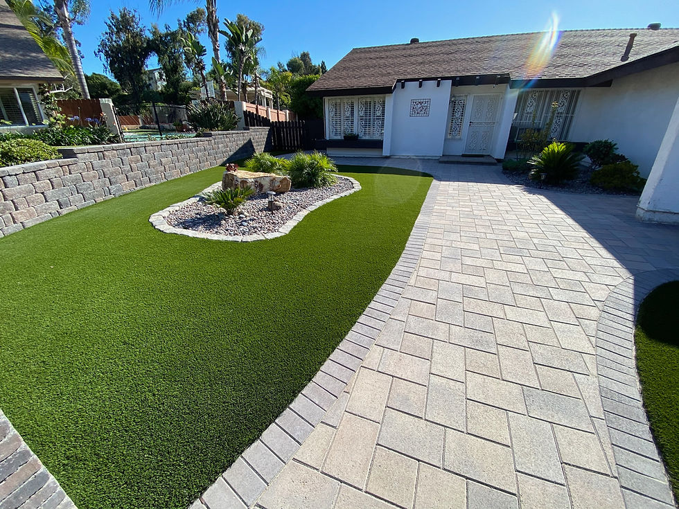 A Grand Welcome – Turf & Paver Entrance Design