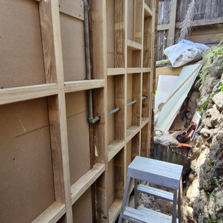 Replacing damaged structural timber and rebuilding wall framing after hidden moisture damage was dis
