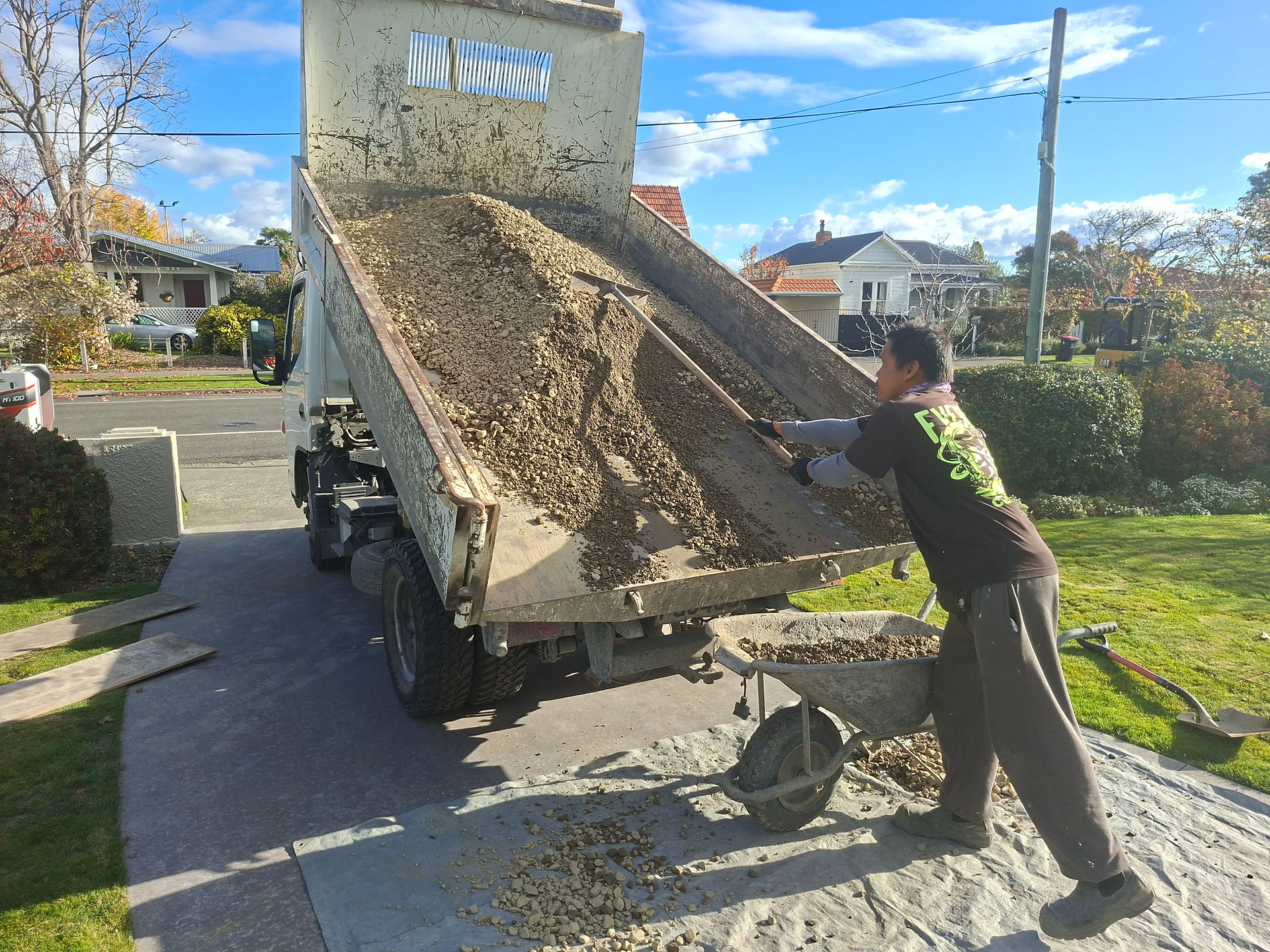 Basecourse being delivered to site for a residential concrete footpath replacement project in Napier