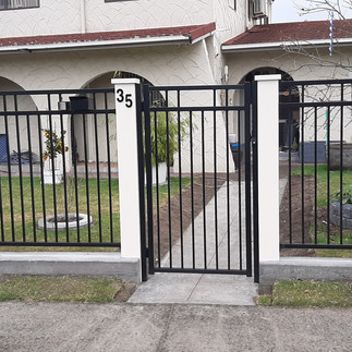 Aluminium rail fence panels in steel large posts