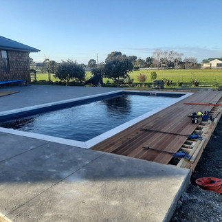 Nearly finish Kwila deck next to swimming pool