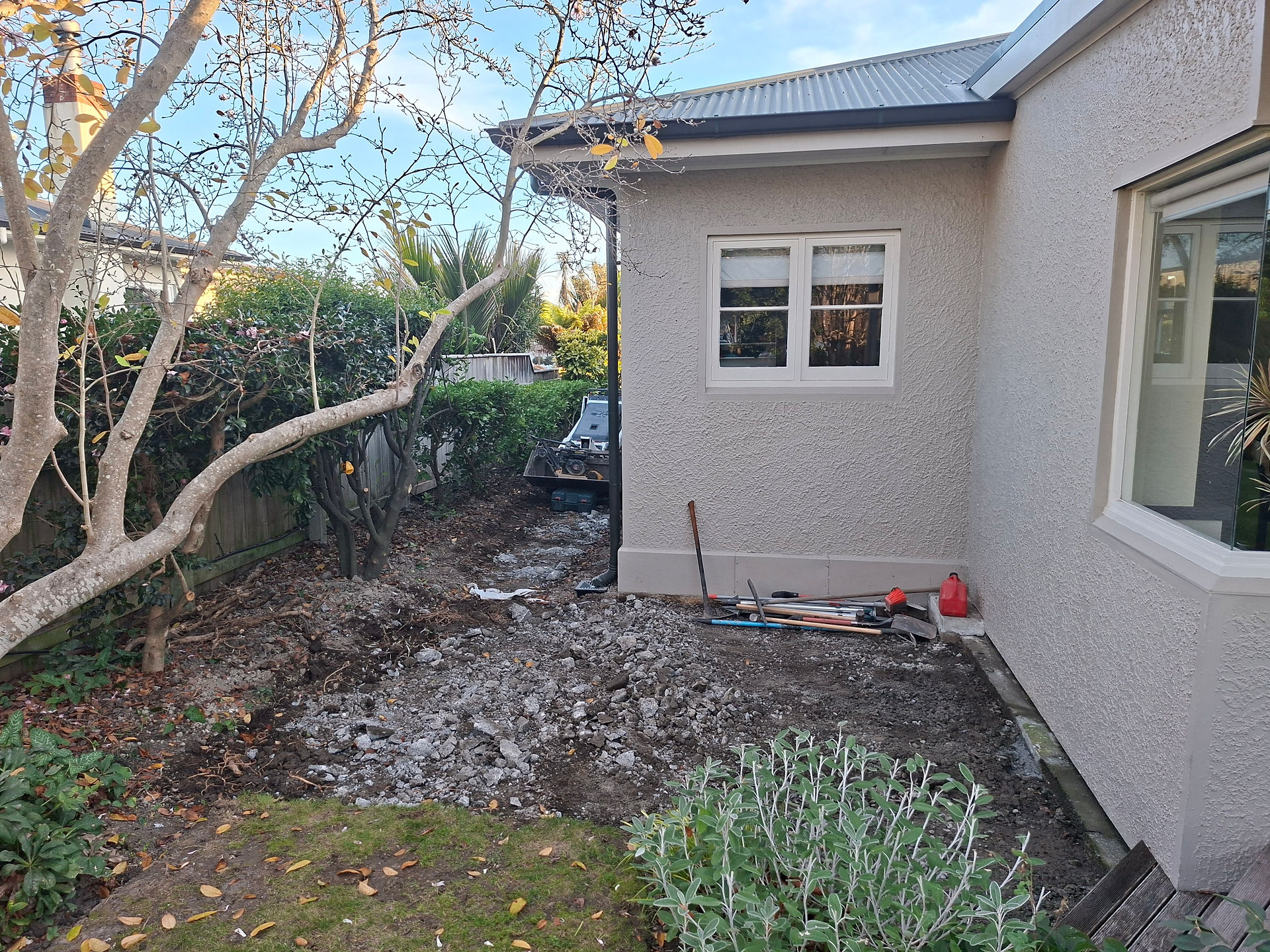 Old concrete pathway demolished and cleared ready for excavation and footpath replacement in Hawke's