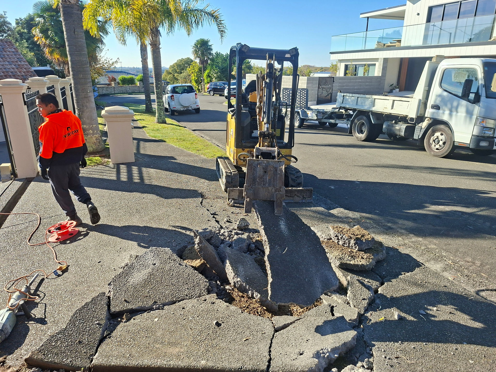 Broken sections of concrete lifted from the old vehicle access by an excavator in Napier.